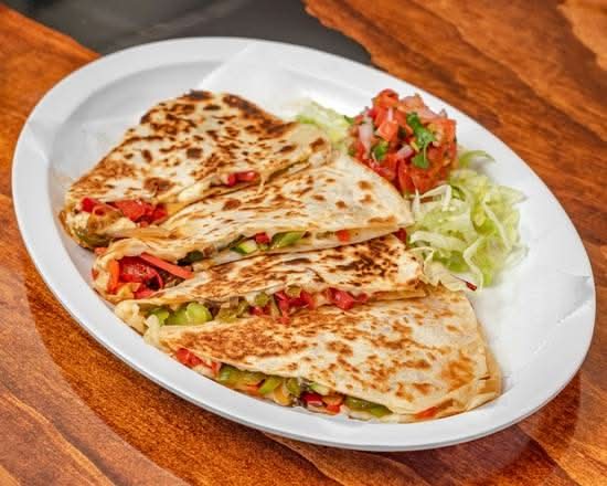 Las Cabañas Mexican Grill & Taqueria signature dishes Chile RellenoSuper QuesadillaBurrito Bowl
